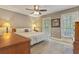 Bedroom with neutral walls, carpet flooring, and natural light at 604 Continental Dr, Lawrenceville, GA 30044