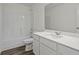 Bathroom with a tub, shower, and a modern vanity setup at 119 Champions Blvd., Dallas, GA 30157