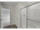 Modern bathroom with a glass-enclosed shower and sleek fixtures at 119 Champions Blvd., Dallas, GA 30157