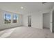 Bright, spacious bedroom with large windows and plush carpeting at 119 Champions Blvd., Dallas, GA 30157