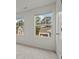 Bedroom with two windows offering pleasant outdoor views and neutral carpeting at 119 Champions Blvd., Dallas, GA 30157