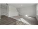 Spacious living room with hardwood flooring and staircase to second floor at 119 Champions Blvd., Dallas, GA 30157