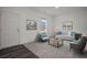 Cozy living room with comfortable seating, natural light, and neutral tones, creating a relaxing atmosphere at 119 Champions Blvd., Dallas, GA 30157