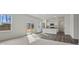 Open-concept living room with stainless steel appliances and sliding door to patio at 119 Champions Blvd., Dallas, GA 30157