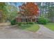 Beautiful brick home with a manicured lawn and walkway at 148 Hurt Road Sw, Smyrna, GA 30082