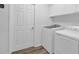 Laundry room featuring a white washer and dryer at 148 Hurt Road Sw, Smyrna, GA 30082