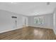Spacious living room with hardwood floors and ample natural light at 148 Hurt Road Sw, Smyrna, GA 30082