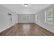 Bright and airy living room with hardwood floors and neutral paint at 148 Hurt Road Sw, Smyrna, GA 30082