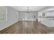Bright living and kitchen area with hardwood floors and natural light at 148 Hurt Road Sw, Smyrna, GA 30082