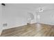 Spacious living room featuring hardwood floors and ample natural light, creating a welcoming atmosphere at 1608 Indian Way, Cumming, GA 30040