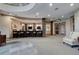 Common area with television, seating and bar at 3621 Vinings Slope Se # 3510, Atlanta, GA 30339