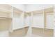 Spacious walk-in closet with custom shelving provides optimal storage solutions at 3621 Vinings Slope Se # 3510, Atlanta, GA 30339