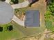 Aerial shot of a single-Gathering home with a circular driveway and lush landscaping at 5285 Winflow Way, Suwanee, GA 30024