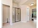 Bright bathroom with a large glass shower and neutral tile at 5285 Winflow Way, Suwanee, GA 30024