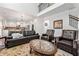 Spacious living area showcases an open floor plan with modern decor at 5285 Winflow Way, Suwanee, GA 30024