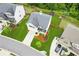 Aerial view of a well-maintained property showcasing its lush green lawn and fenced backyard at 6360 Boulder Rdg, Cumming, GA 30028