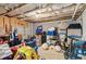 Unfinished basement with exposed ceiling, concrete walls, and ample space for storage at 6360 Boulder Rdg, Cumming, GA 30028
