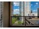 Balcony view overlooking parking garage and nearby high rise buildings at 1101 Juniper Ne St # 632, Atlanta, GA 30309
