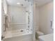 Modern bathroom with a glass-enclosed tub, shower, and integrated toilet at 1101 Juniper Ne St # 632, Atlanta, GA 30309