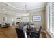 Dining room with hardwood floors open to the living room at 1101 Juniper Ne St # 632, Atlanta, GA 30309