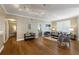 Bright living room with hardwood floors, track lighting, and comfortable seating at 1101 Juniper Ne St # 632, Atlanta, GA 30309