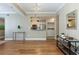 A spacious living room with hardwood floors, neutral walls, and an open layout to a kitchen area at 1101 Juniper Ne St # 632, Atlanta, GA 30309