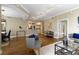 Living room with hardwood floors and view to the kitchen and dining area at 1101 Juniper Ne St # 632, Atlanta, GA 30309