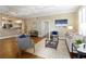 Cozy living room with hardwood floors, stylish furniture, and a view to the kitchen at 1101 Juniper Ne St # 632, Atlanta, GA 30309