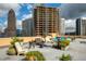Rooftop terrace featuring lounge chairs, coffee tables, and city views at 1101 Juniper Ne St # 632, Atlanta, GA 30309
