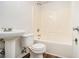A basic bathroom featuring a sink, toilet, and shower-tub combo at 1104 Driftwood Ct, Mcdonough, GA 30252