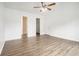 Clean bedroom showing new floors, neutral walls, and multiple closets for ample storage solutions at 1104 Driftwood Ct, Mcdonough, GA 30252