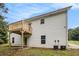 A home's exterior view shows the house's siding and the second-story deck at 1104 Driftwood Ct, Mcdonough, GA 30252