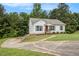 Lovely one-story home with neutral siding, a neat front yard, and a pathway leading to the front entrance at 1104 Driftwood Ct, Mcdonough, GA 30252