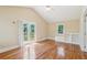 Bedroom with hardwood floors, vaulted ceilings, a ceiling fan, and sliding doors to a private deck at 2055 Cactus Ln, Cumming, GA 30040