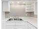 Bright kitchen with white cabinets, countertops and double stainless steel sink at 2055 Cactus Ln, Cumming, GA 30040
