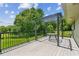 Covered patio with decorative pergola, metal railing, and green view at 2055 Cactus Ln, Cumming, GA 30040