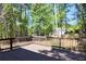 Large wooden back deck overlooking private wooded backyard at 2745 Saxon Drive, Duluth, GA 30096