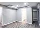 Finished basement area with ensuite bathroom and new laminate flooring at 2745 Saxon Drive, Duluth, GA 30096