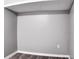 Finished basement room with new gray paint and vinyl flooring at 2745 Saxon Drive, Duluth, GA 30096