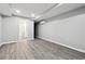 Basement with vinyl floors leading into the bathroom at 2745 Saxon Drive, Duluth, GA 30096