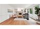 Bright living room featuring a fireplace, modern furniture, hardwood floors, and natural light at 2745 Saxon Drive, Duluth, GA 30096