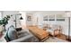 Cozy living room features a gray couch, hardwood floors, and stylish decor at 2745 Saxon Drive, Duluth, GA 30096