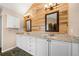 Bathroom includes dual sinks, granite countertops and modern fixtures at 4715 Northridge Dr, Cumming, GA 30040