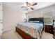 Bedroom with a ceiling fan, windows and furniture at 4715 Northridge Dr, Cumming, GA 30040