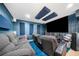 Finished theater room with comfortable seating and large screen at 4715 Northridge Dr, Cumming, GA 30040