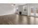 Spacious living room featuring a fireplace, ceiling fan, and lots of natural light at 7169 Linden Dr, South Fulton, GA 30349