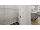 Bright pantry with adjustable wire shelving for optimal storage solutions and easy organization at 7169 Linden Dr, South Fulton, GA 30349