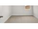 Carpeted bedroom with neutral walls, ample natural light, and a cozy atmosphere at 7171 Linden Dr, South Fulton, GA 30349