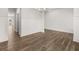 Spacious dining area features hardwood floors, wainscotting detail, and stylish chandelier at 7171 Linden Dr, South Fulton, GA 30349