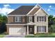 Charming two-story home featuring a brick and stone facade with an attached two-car garage at 7171 Linden Dr, South Fulton, GA 30349